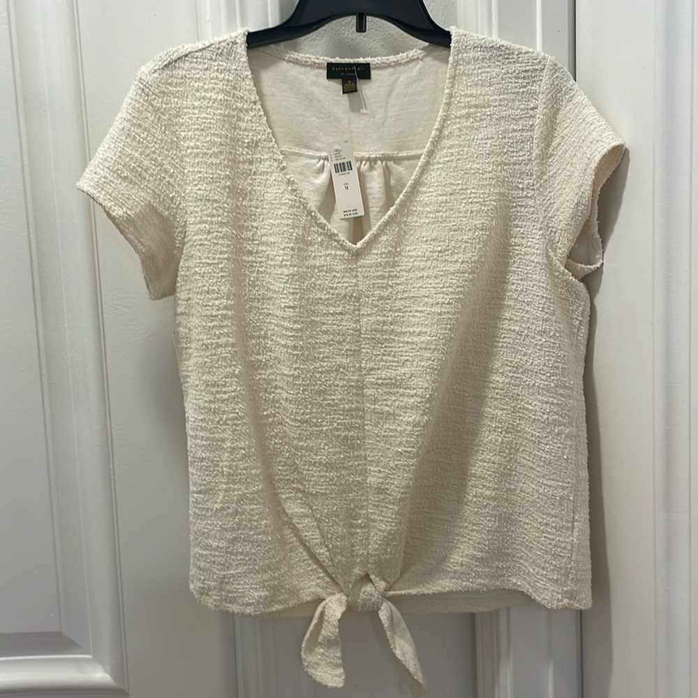 Anthropologie cream colored top with tie at waist